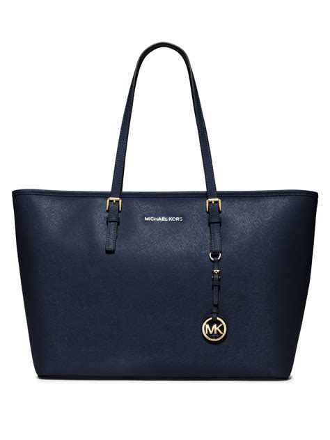 michael kors jet set travel tote bag navy|Michael Kors bag with airplanes.